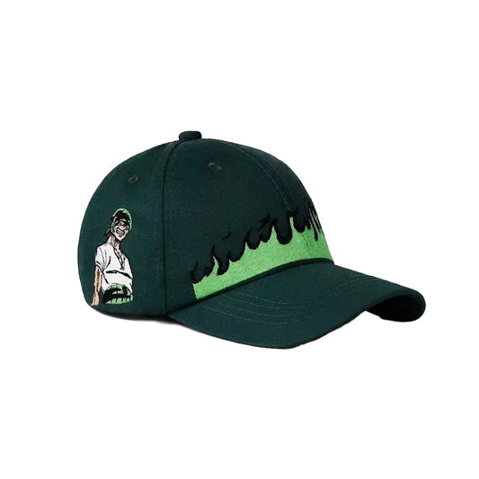 Green cap with embroidered design on a white background
