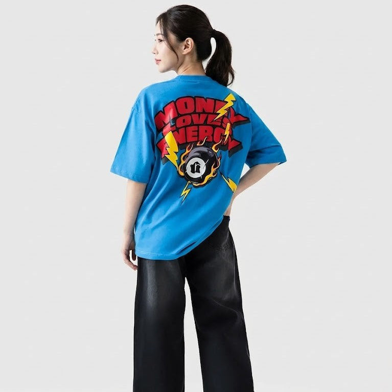 Person wearing a blue t-shirt with a colorful graphic design on a white background