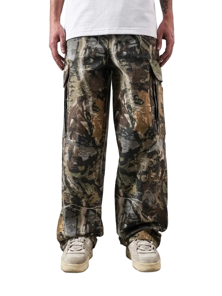 Camouflage cargo pants worn by a person on a white background