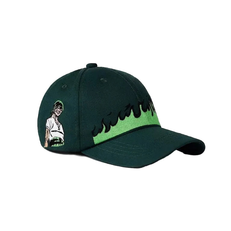 Green cap with embroidered design on a white background