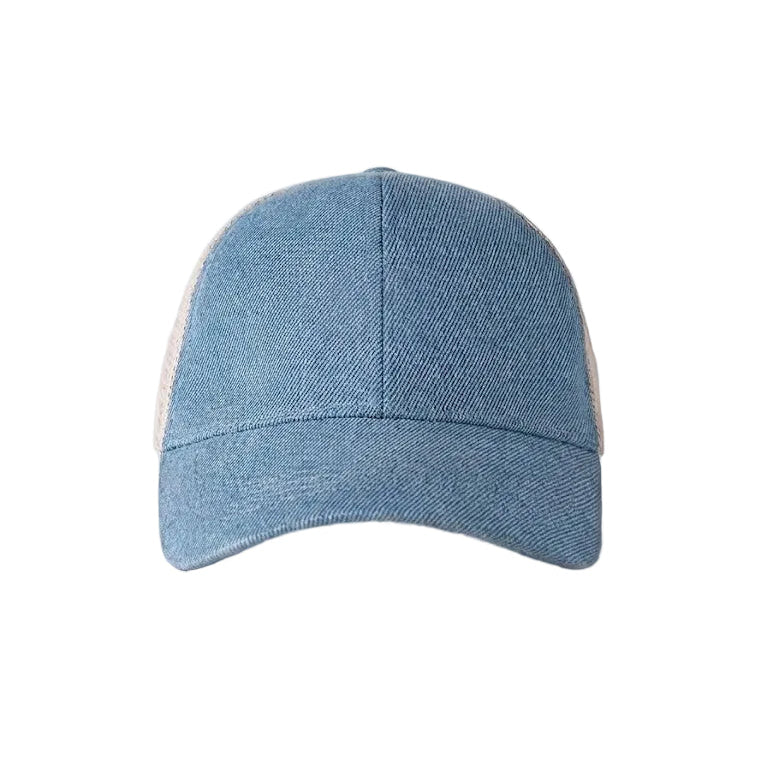 Blue denim cap on a white background