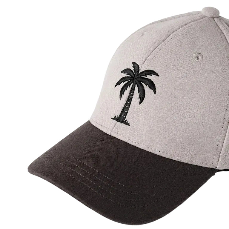 Cap with a palm tree design on a white background