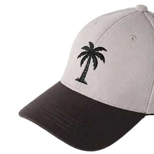 Cap with a palm tree design on a white background