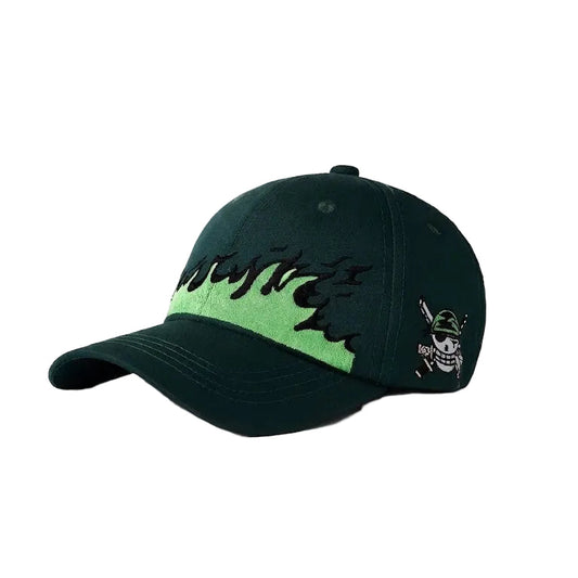Black and green cap with skull design on a white background