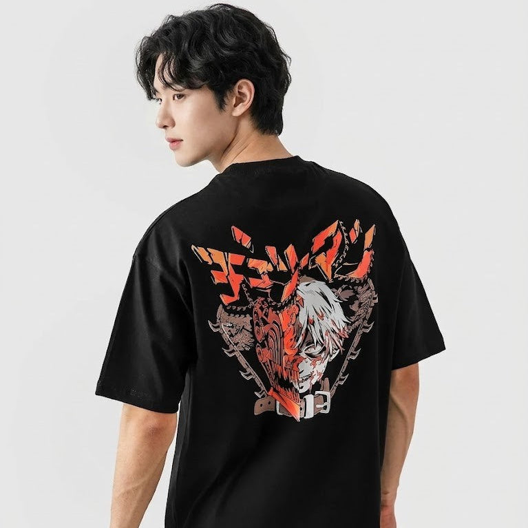 Person wearing a black t-shirt with a graphic design on the back against a white background