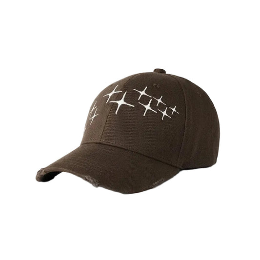 Brown cap with white star-like pattern on a white background