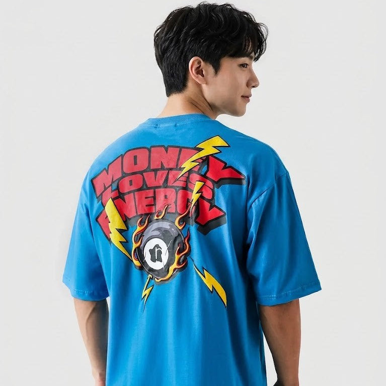 Person wearing a blue t-shirt with a colorful graphic on the back against a white background