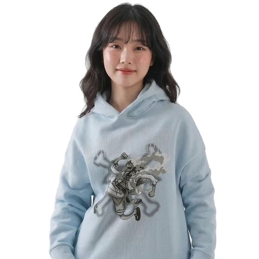 Person wearing a light blue hoodie with a graphic design on a white background